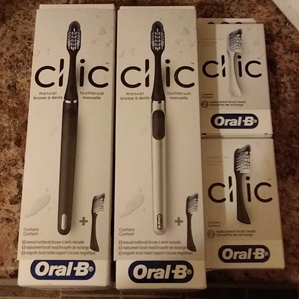 Oral Clic Toothbrush and replacement heads